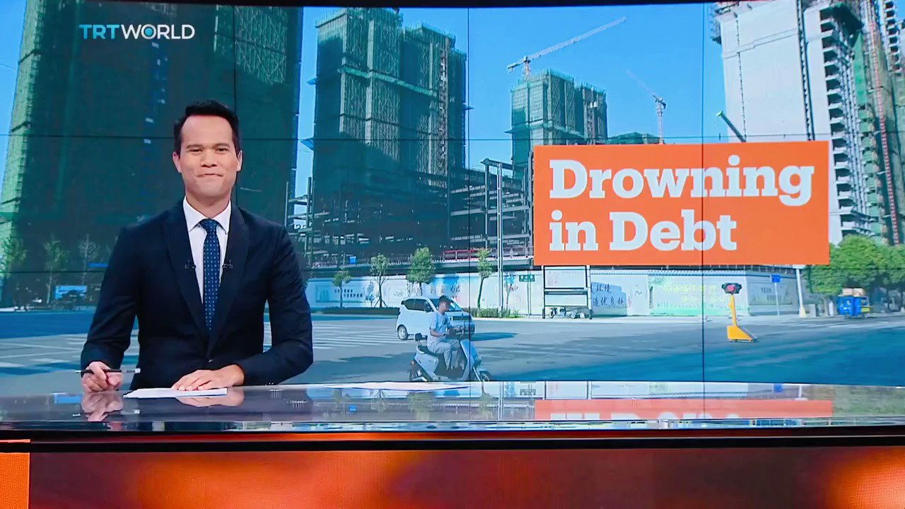 CHINA DROWING IN DEBT